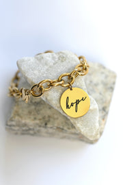 Guldfärgat armband: Hope
