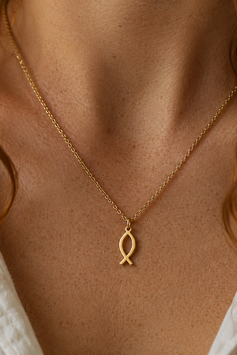 Guldfärgat halsband: Jesusfisken