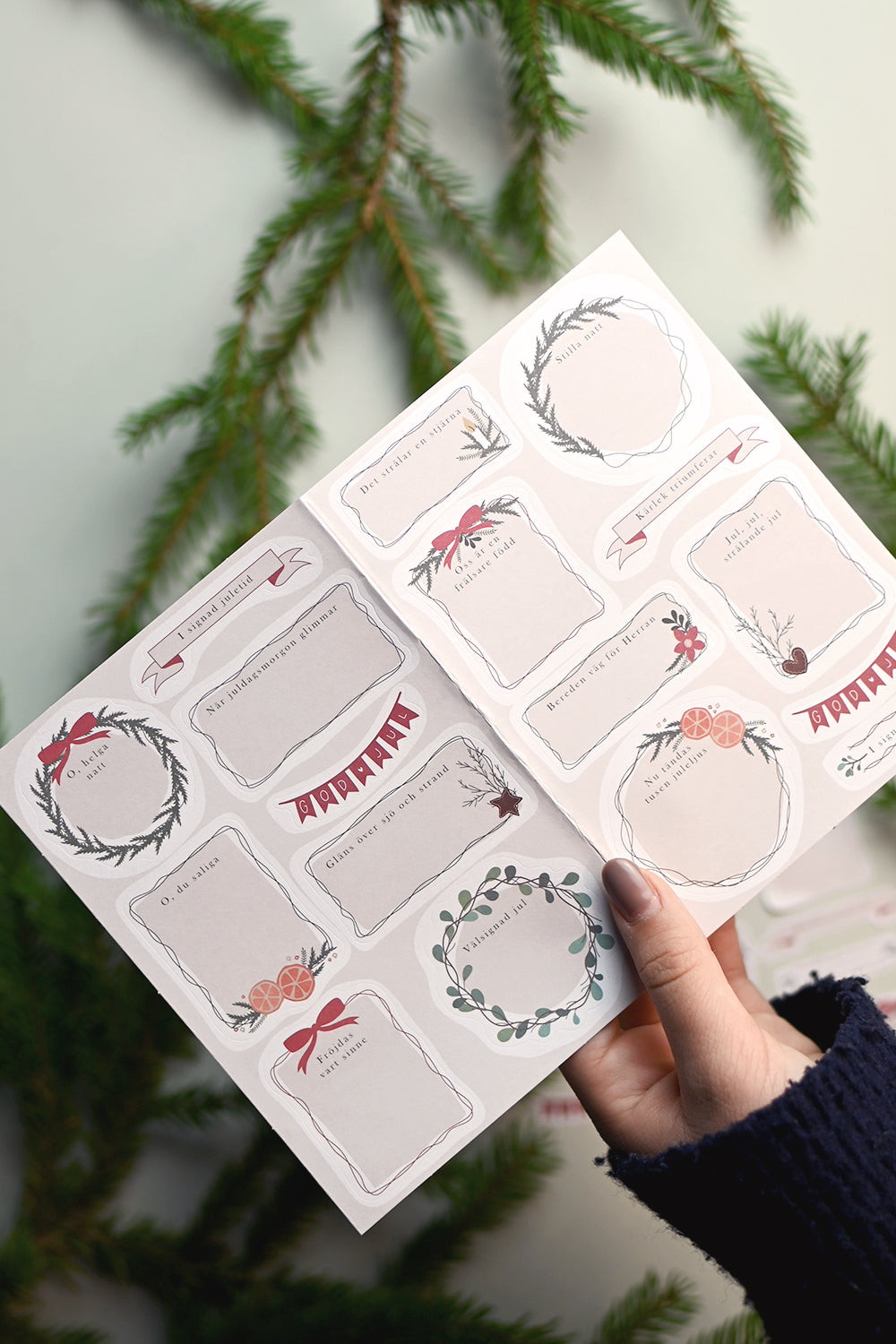 Klistermärkesark: Ettiketter med strofer från julsånger