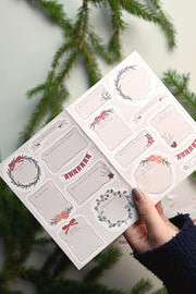 Klistermärkesark: Ettiketter med strofer från julsånger