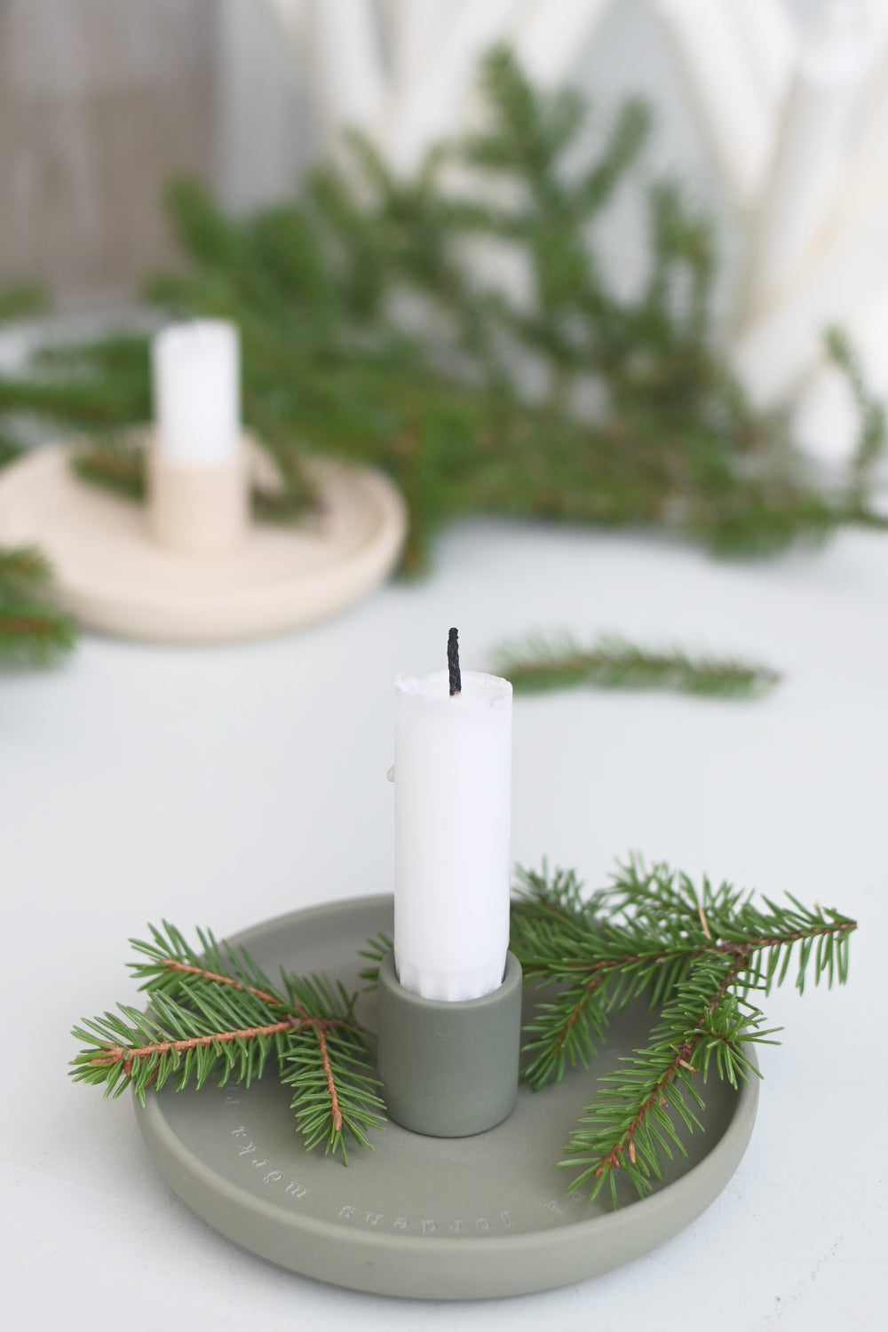 Grön ljusstake: Nu tändas tusen juleljus